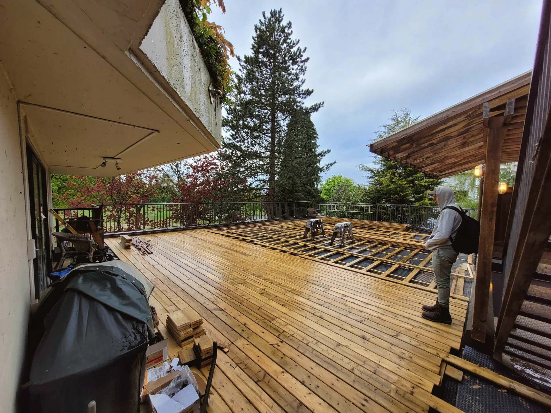 Deck renovation mid-construction with new framing installed