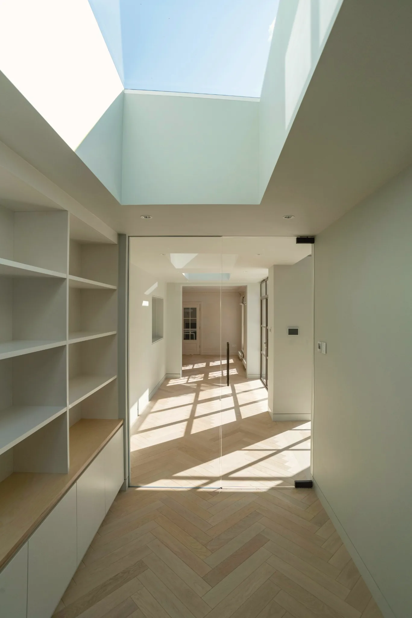 Open concept kitchen and living area after a full home renovation in Metro Vancouver